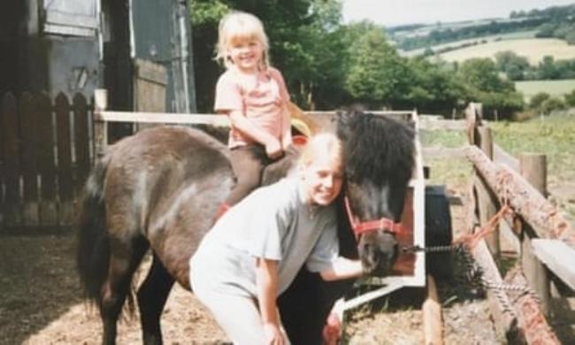 Bright on her first pony, Fidget, aged three.